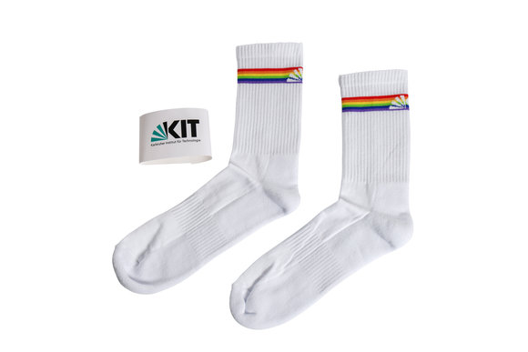 White tennis socks of the KIT with rainbow stripes.